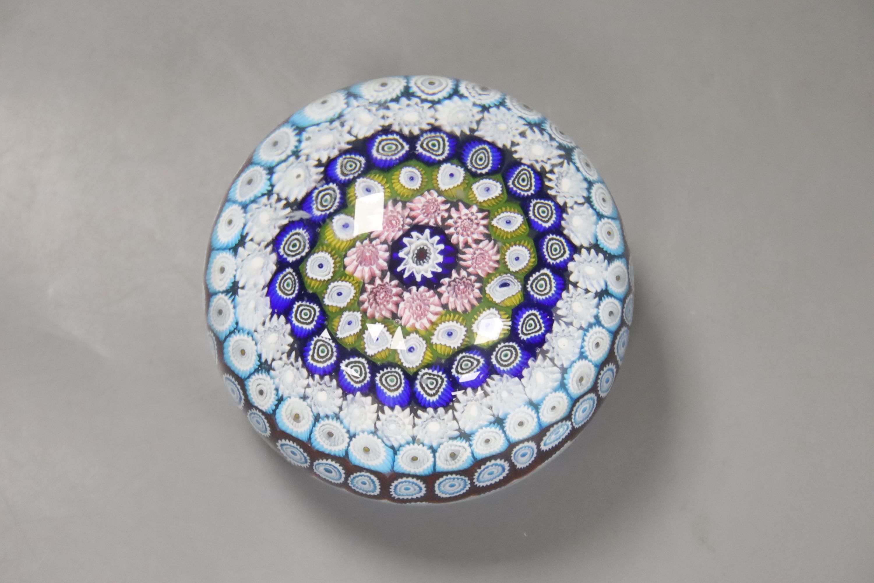 A millefiori glass magnum paperweight, 9cm.